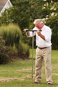 Bill Meagher collecting soil sample